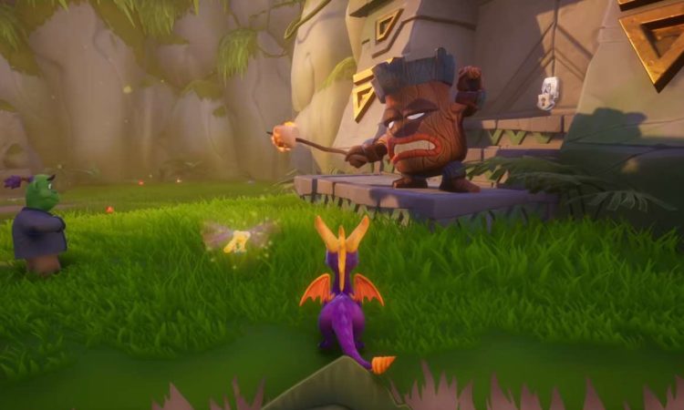 Spyro Reignited Trilogy gameplay with Spyro and Sparks the dragonfly in view staring toward an enemy