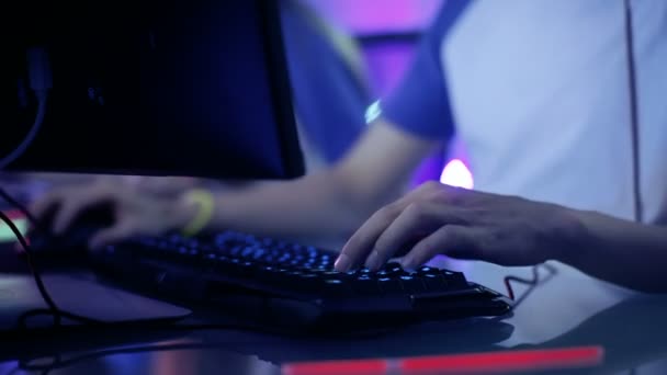 Close up of a gamer playing video games at a LAN event