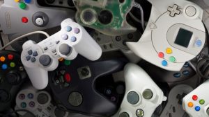 A collection of different controllers from a variety of games consoles