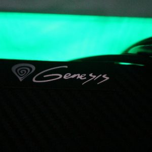 Genesis logo with RGB green lighting in the background