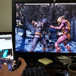 Fighting Games streamed to monitor whilst being played on mobile