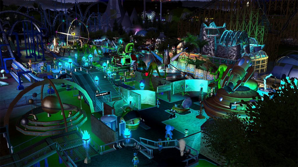 RollerCoaster Tycoon 3: Complete Edition theme park at night all lit up