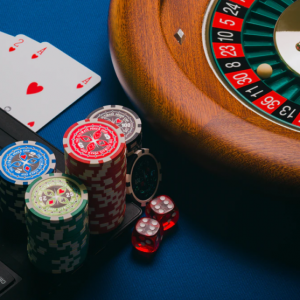 Casino roulette wheel, chips, cards and dice used in real casinos