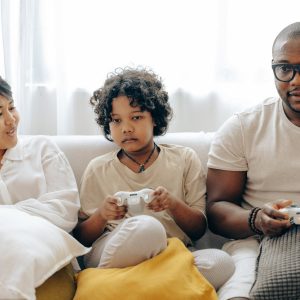 School Child playing games with Parents/Family building relationships