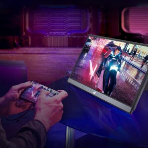 ASUS Republic of Gamers Strix XG16 set up on a coffee table for online gaming on the go