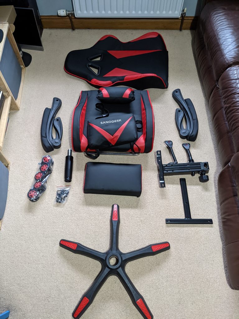 Sanodesk Gaming Chair GC01 parts laid out on the floor