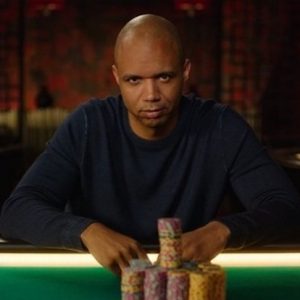 Casino Player at a table with a stack of chips