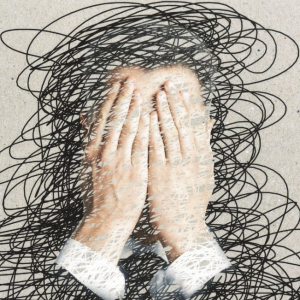 Person holding their face with a messy background indicating stress