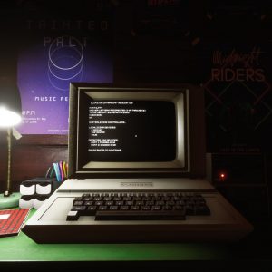 Suffer The Night header showing an old computer