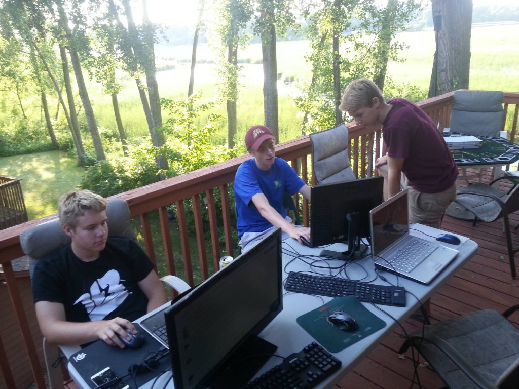 Gamers gaming outside in the summer