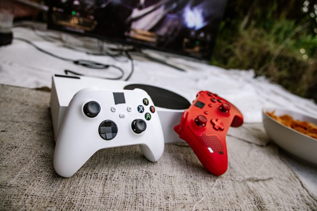 Xbox Series S and Controllers in white and red