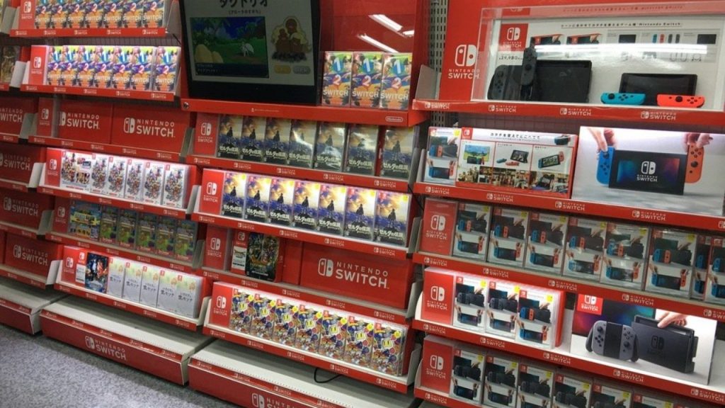 Nintendo wall at a video game retail store showcasing its games and Nintendo Switch console