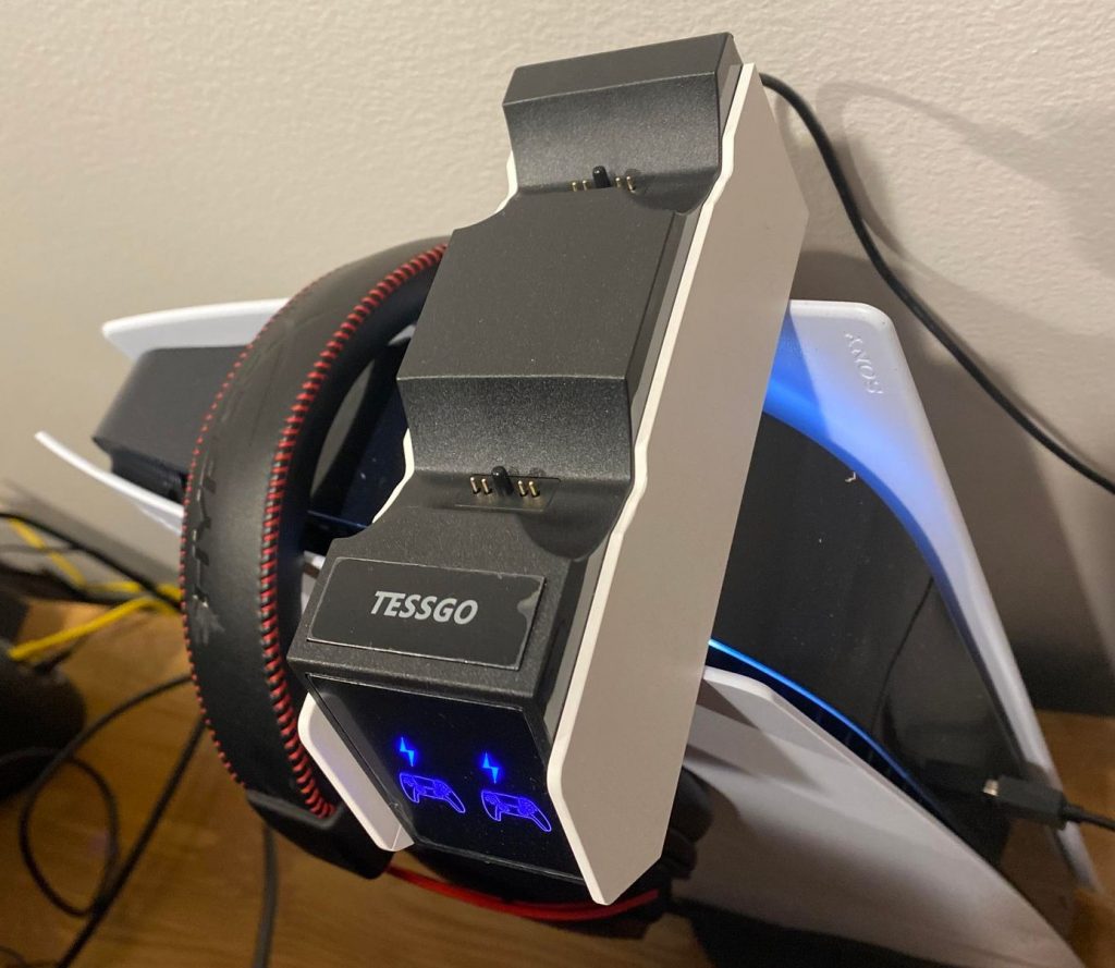 TESSGO PS5 Controller Charger resting on top of PS5