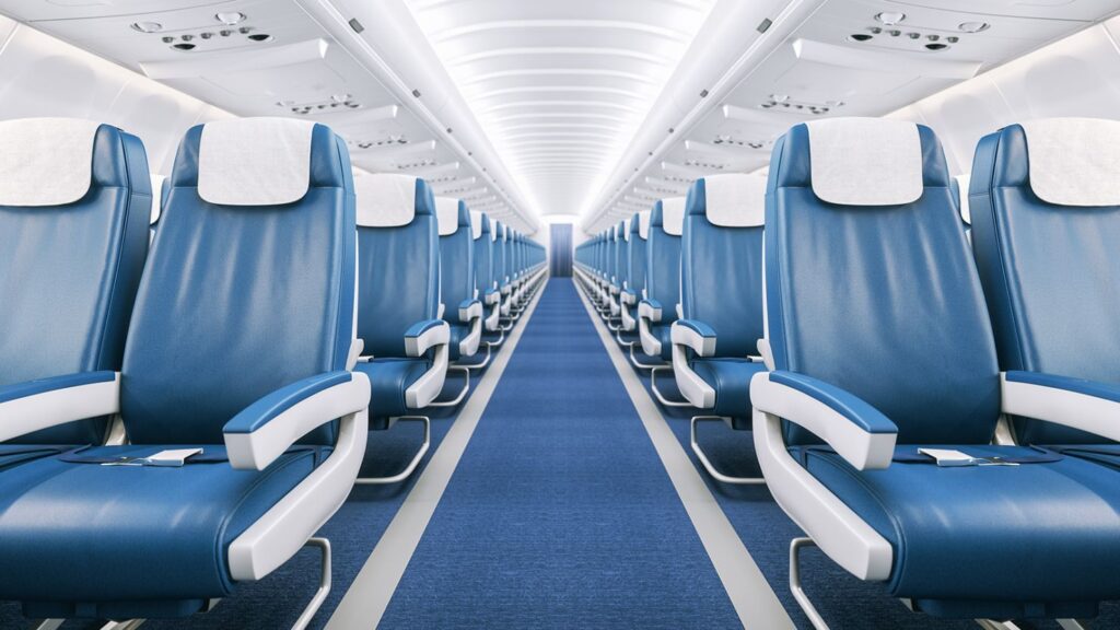 Aisle view of the interior of a plane
