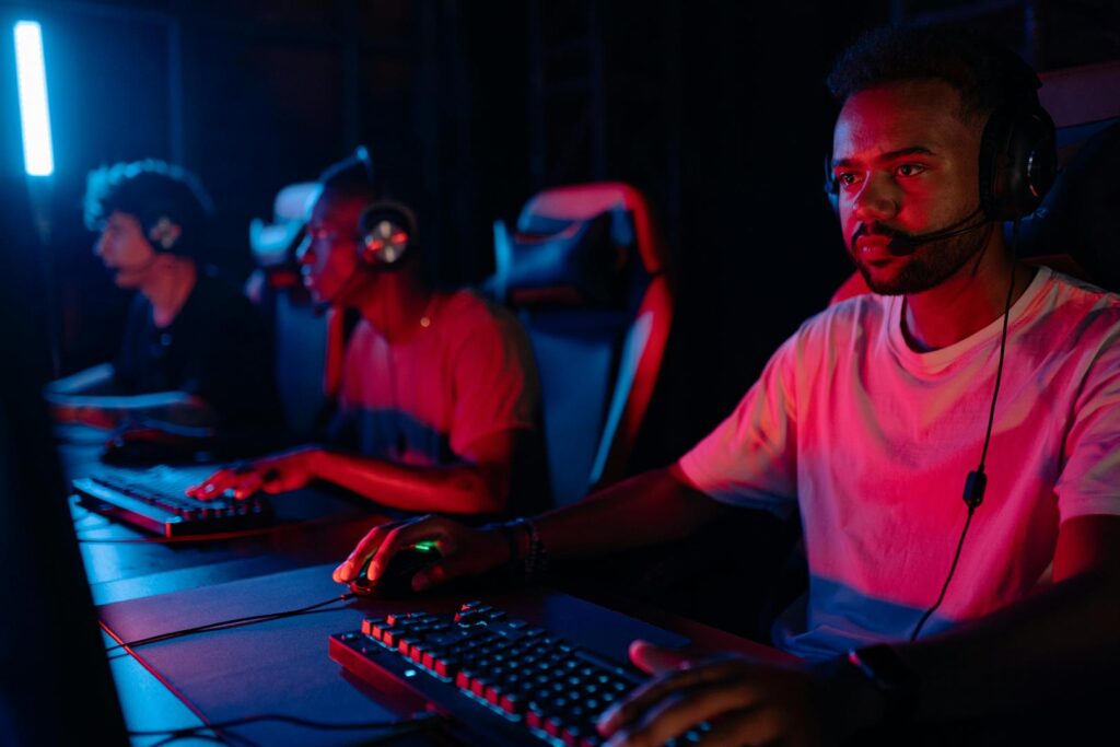 Gamers concentrating while playing mind sports on PC
