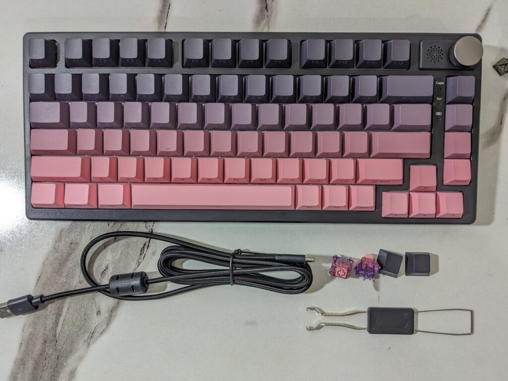 Epomaker HE75 Tri - Cables and Accessories next to keyboard