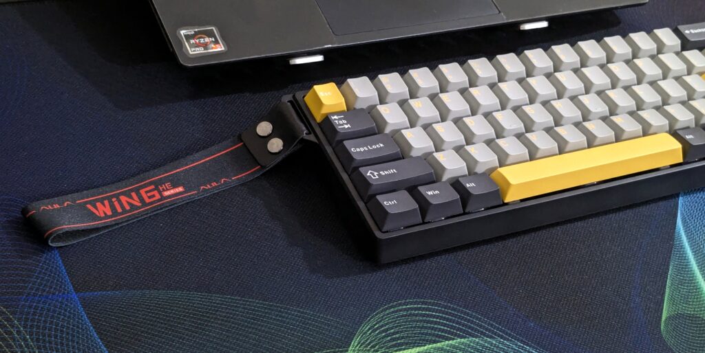 AULA WIN60 HE Max with ribbon attached