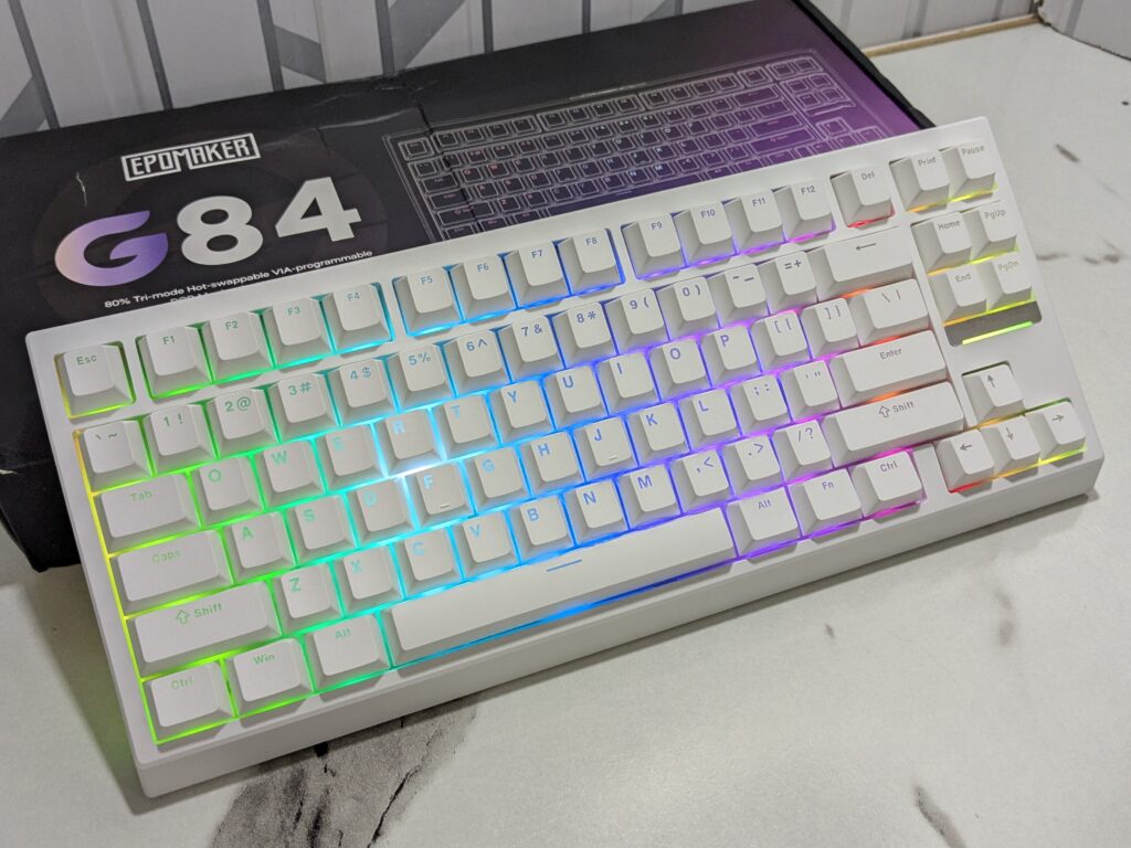 EPOMAKER G84 Mechanical Keyboard leaning on the box