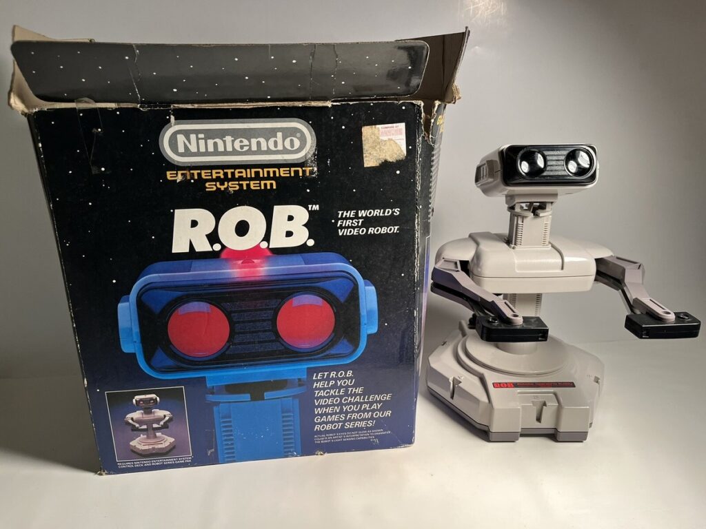 Vintage NES R.O.B. Peripheral next to original box